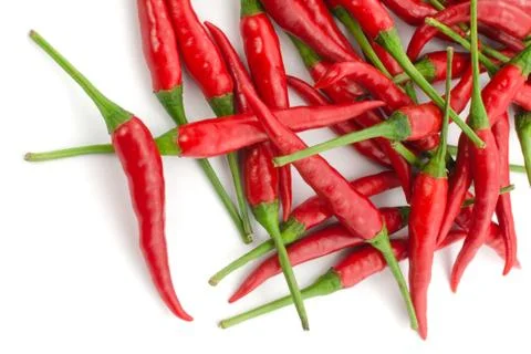 Stack of hot chili pepper or small chili padi, isolated on white background Stock Photos
