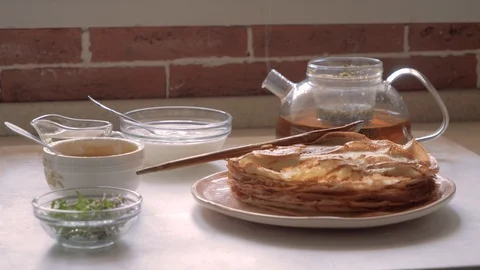 Stack of hot classic Russian thin pancakes. Rustic style. Stock Footage 112912715