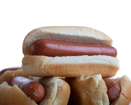 A stack of hotdogs and buns on a white background Stock Photos