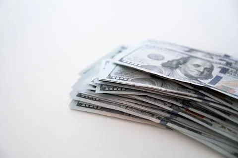 Stack of hundred bills on the table. Banner with place for text. Business Stock Photos