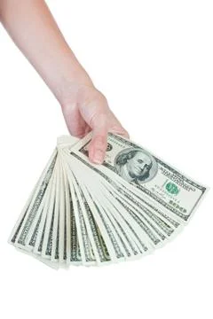 Stack of hundred dollar bills in hand Stock Photos