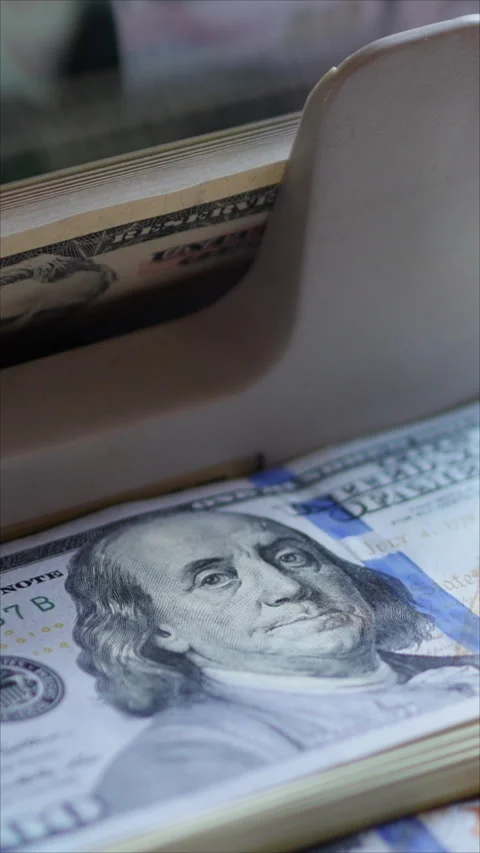 Stack Of Hundred Dollar Bills In A Money Counting Machine. Vertical.  Stock Footage 285795961