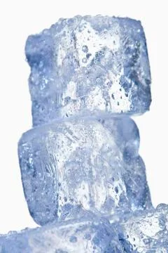 Stack of ice cubes against white background, close up 스톡 사진
