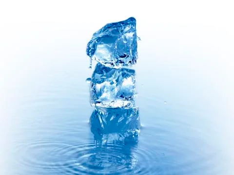 Stack of ice cubes in water 스톡 사진