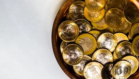 Stack of Indian 10 rupee currency coins on a white background Stock Photos
