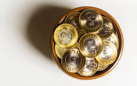 Stack of Indian 10 rupee currency coins on a white background Stock Photos