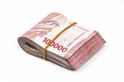 Stack of Indonesian 100,000 Rupiah Banknotes Isolated on White Background Фото