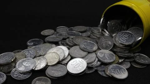 Stack of Indonesian coins isolated Stock Photos