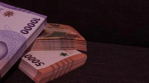 Stack of indonesian currency isolated Stock Photos