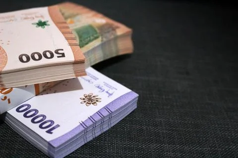 Stack of indonesian currency isolated Stock Photos