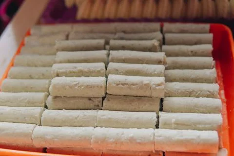 Stack of Indonesian rice dumpling, cooked with coconut milk named buras. Stock Photos