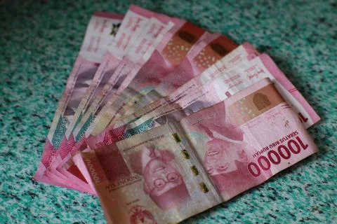 A Stack of Indonesian Rupiah Banknotes showcasing financial affluence Stock Photos