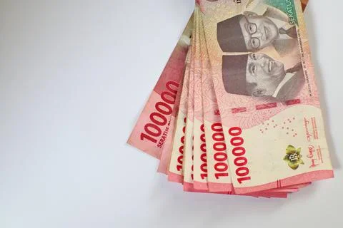 Stack of Indonesian Rupiah Banknotes Showing Sukarno and Hatta Stock Photos