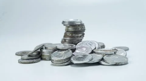 Stack of Indonesian Rupiah currency coins on a white background Stock Photos