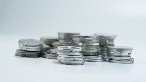 Stack of Indonesian Rupiah currency coins on a white background Stock Photos