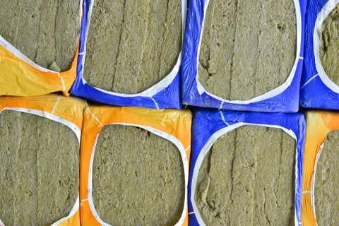 Stack  of  insulating sheets of basalt mineral wool packages  in plastic foil Stock Photos