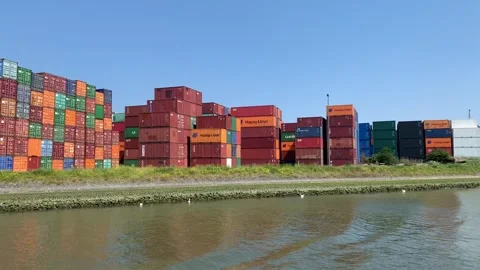 Stack of intermodal shipping containers at Rotterdam harbour, port. Netherlands Stock Footage 245584917