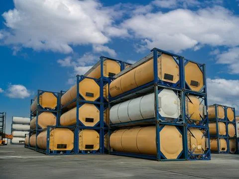 Stack of ISO tank containers in logistics terminal. Stock Photos
