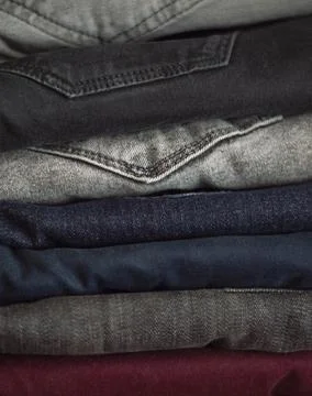 Stack of jeans, close up texture 写真素材