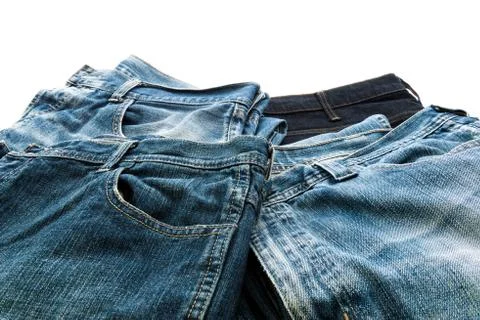 Stack of jeans isolated on white background Stock Photos