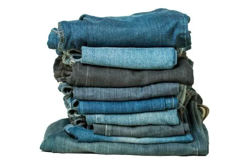 Stack of jeans isolated on white Stock Photos