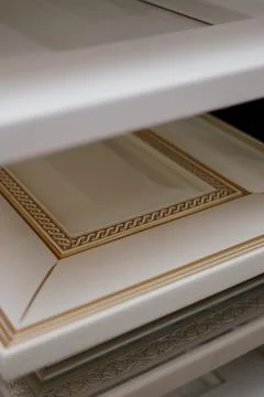 A stack of kitchen cabinet samples in different colors and textures Stock Photos