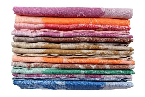 Stack of kitchen linen towels on a white background. Isolate for natural fa.. Stock Photos