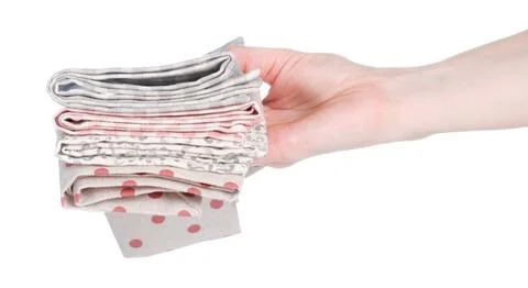 Stack kitchen towel in hand Stock Photos