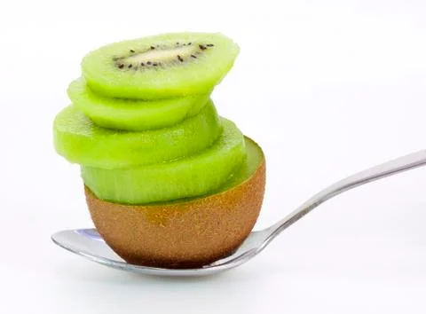A stack on kiwi fruit on the spoon Stock Photos