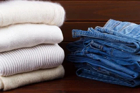 Stack of knitted sweaters Stock Photos