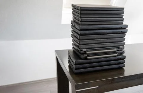 Stack of laptop computers: Laptops are used and second hand, might be for people Stock Photos