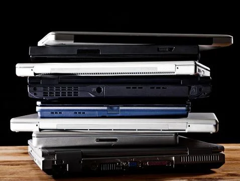 Stack of laptop computers Stock Photos
