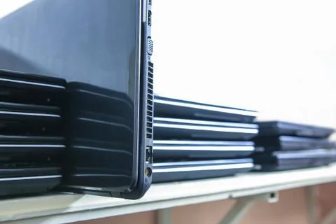 A stack of laptops. Closeup Stock Photos