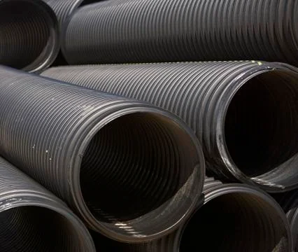 Stack of large metal pipes Stockfoto's