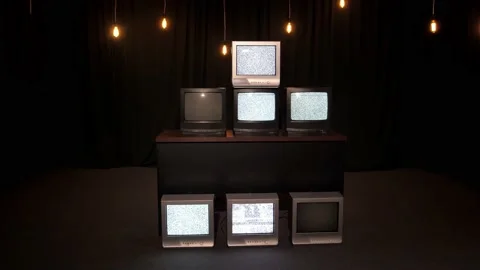 A stack of a large number of old televisions with a glitch pattern Stock Footage 218626327