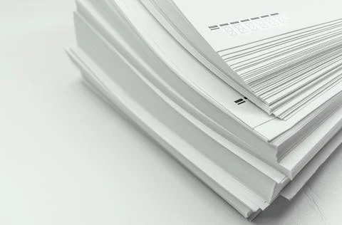A stack of large white postal envelopes. Packaging for letters and documents Stock Photos