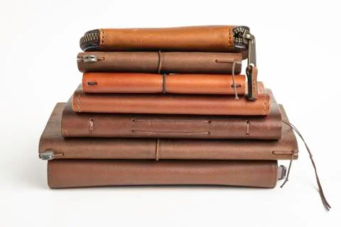 A Stack Of Leather-Bound Journals, Notebooks, Wallets &amp; Cases Foto stock