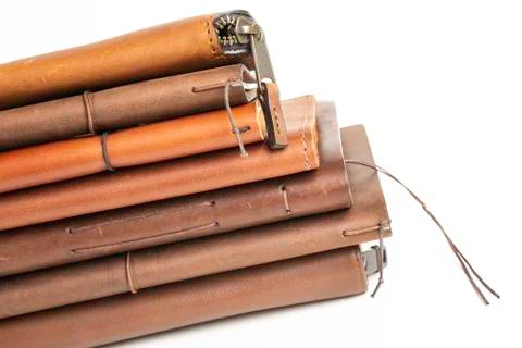 A Stack Of Leather-Bound Journals, Notebooks, Wallets &amp; Cases Foto stock