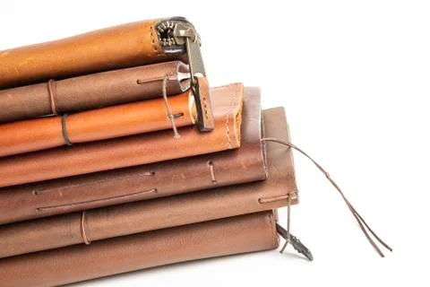 A Stack Of Leather-Bound Journals, Notebooks, Wallets &amp; Cases Stock Photos