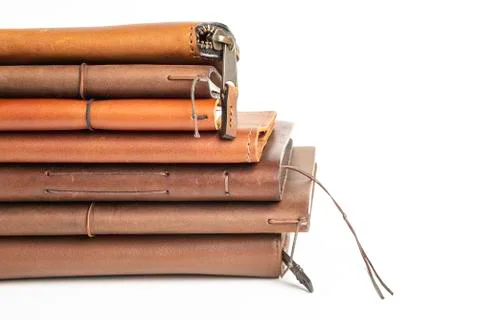 A Stack Of Leather-Bound Journals, Notebooks, Wallets &amp; Cases Foto stock