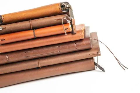 A Stack Of Leather-Bound Journals, Notebooks, Wallets &amp; Cases Stock Photos