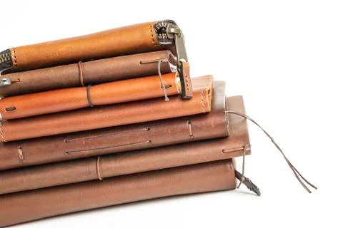 A Stack Of Leather-Bound Journals, Notebooks, Wallets &amp; Cases Stock Photos