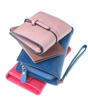 Stack of leather wallets isolated on white background 库存照片