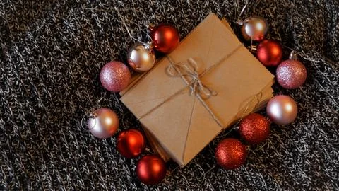 Stack of letters from craft paper with christmas red and pink balls 스톡 사진