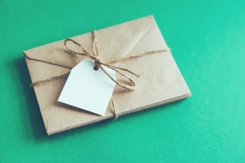 A stack of letters on a green background. Foto stock