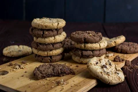 A stack of light and dark chocolate cookies is isolated. Delicious chocolate Stock Photos
