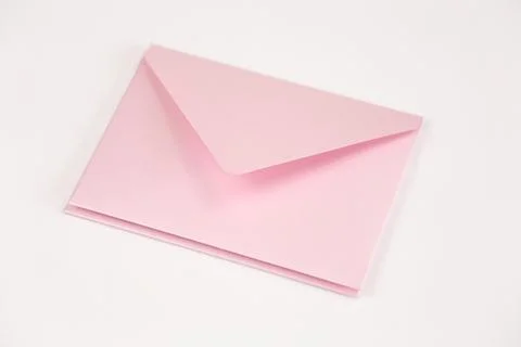 Stack of light pink open envelope on white isolated background. Two envelopes Stockfoto's