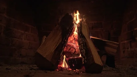 Stack Of Logs Burning In A Fireplace Video stock 154383642
