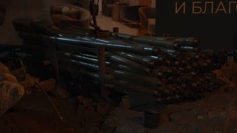 A stack of long heavy drill pipes at construction site. Stock Footage 342372871