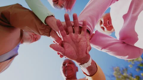 Stack, low angle and people outdoor for fitness, unity or support with senior Stock Footage 347176805